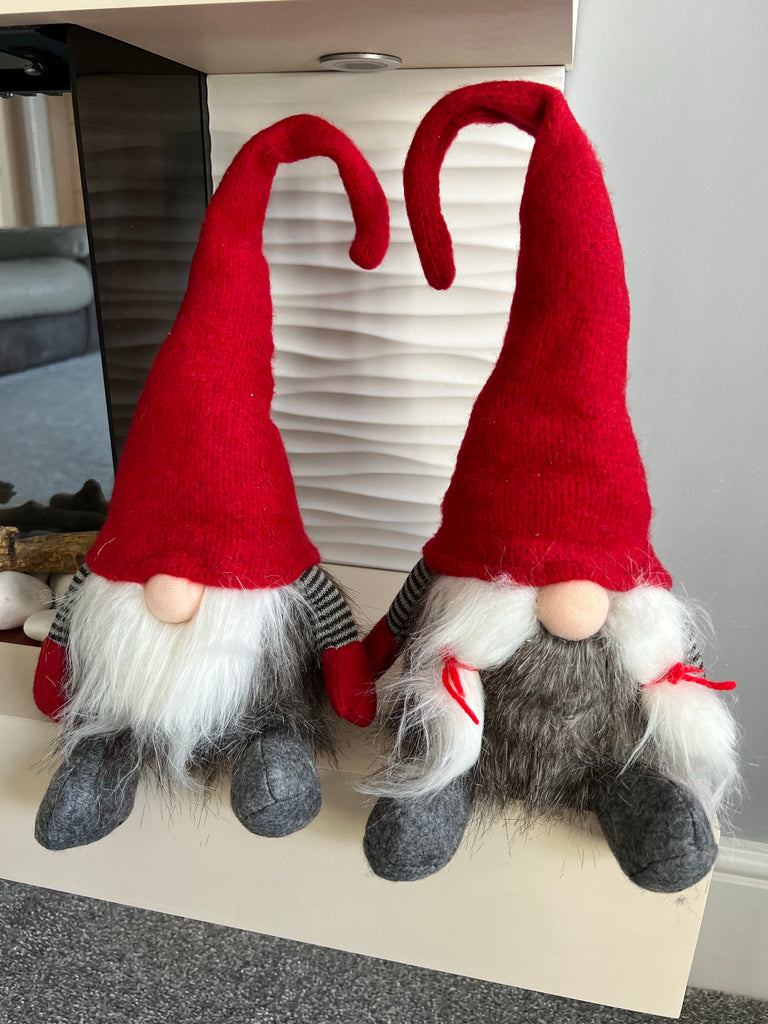 Mr & Mrs Santa in big red hats