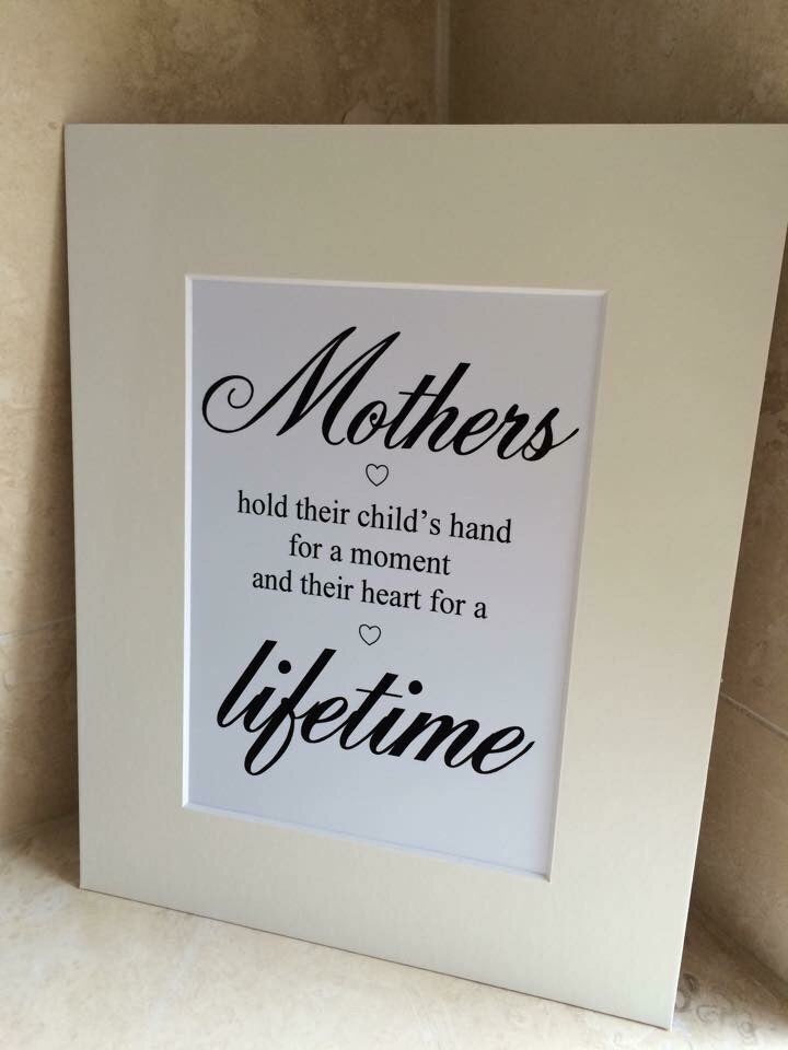 Mothers hold their child's hand 10x8 mount (unframed)